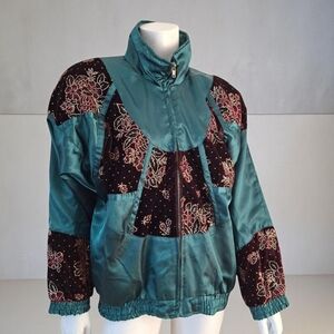 LAVON Vintage puffy windbreaker in green and burgundy with embroidered flowers.